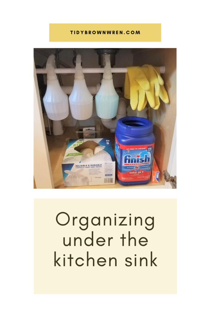 Organizing under the kitchen sink/tidybrownwren.com